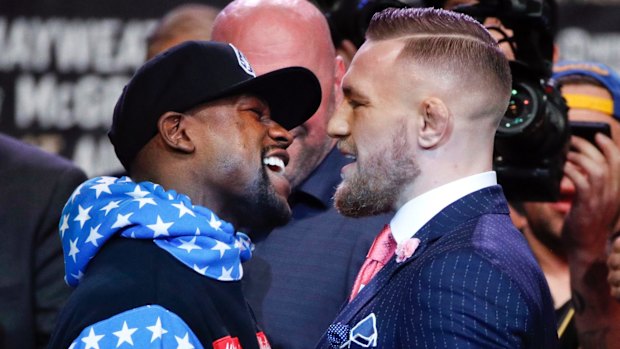 Fighters Floyd Mayweather jnr and Conor McGregor get up close and personal.