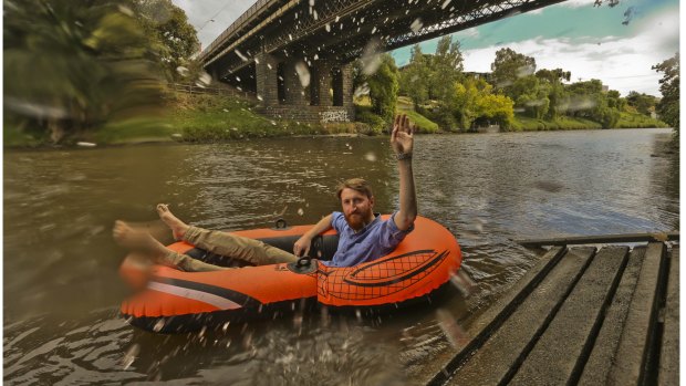 Courtney Carthy in an inflatable boat on the Yarra.
