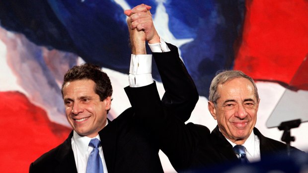 Mario Cuomo, right, and his eldest son Andrew celebrate the latter's election as New York attorney-general in 2006.