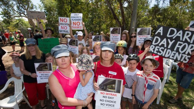 Murrumbeena residents Karlee Browning and Tracey Bigg attend a protest earlier this month against a proposed elevated railway line. 