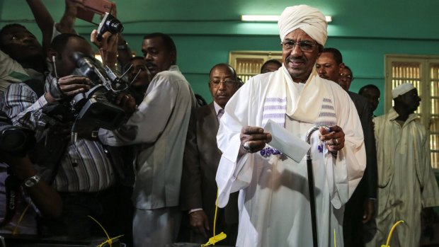 Sudanese President Omar al-Bashir casts his ballot as he runs for another term.