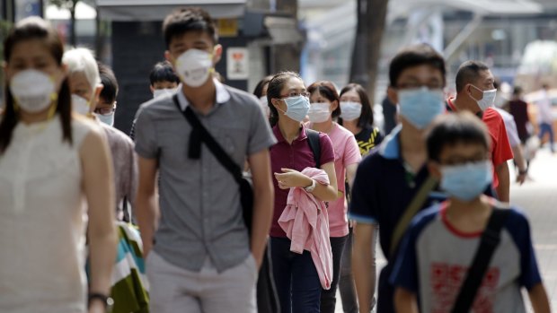 Masks are worn as a precaution against the MERS virus in Seoul.