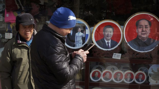 Souvenir plates bearing images of Chinese President Xi Jinping and former leaders including Mao Zedong at a shop near Tiananmen Square in Beijing last month.