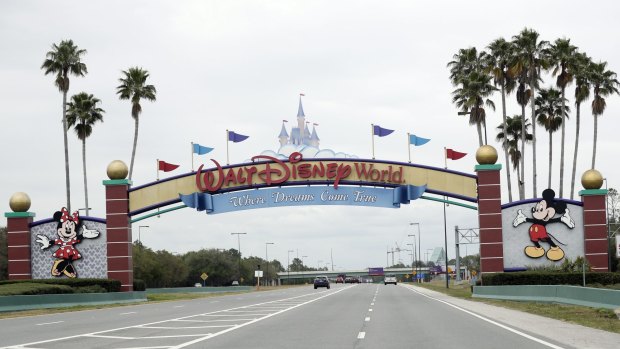 The road to the entrance of Walt Disney World in Florida has few cars.