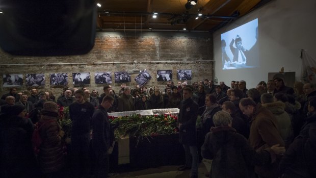 People gather to pay their last respects at the coffin of Boris Nemtsov during the farewell ceremony.