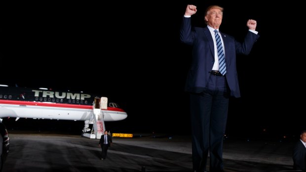 Donald Trump arrives to speak at a campaign rally in Kinston, North Carolina on Wednesday.