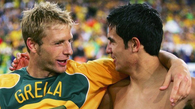 Relief: Vince Grella and Tim Cahill celebrate Australia's victory over Uruguay on November 16, 2005.