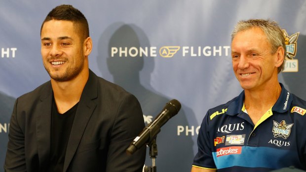 Happier days: Jarryd Hayne with Gold Coast coach Neil Henry after he signed with the Titans last season.