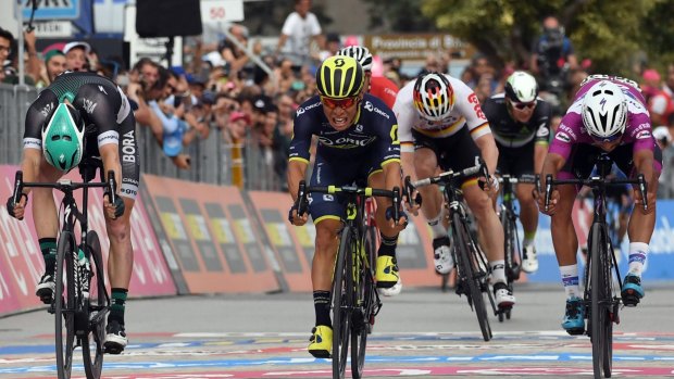 Caleb Ewan sprints to victory in the seventh stage of the Giro d'Italia.