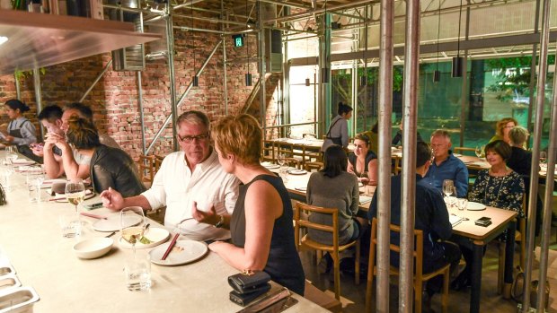 Sunda's industrial fitout consists of scaffolding overhanging a concrete bar.