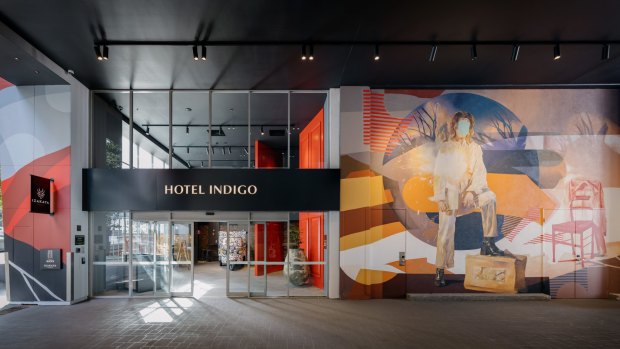 Step through Hotel Indigo's the giant red doors to find it jam-packed with original artworks and murals.