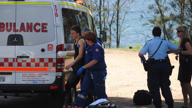 Paramedics with the injured teen at Mollymook.