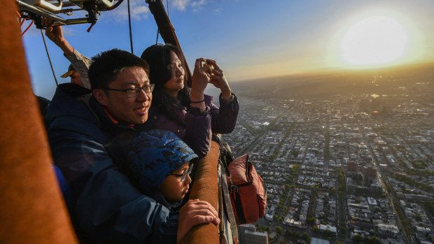 Wei Chen, Zhu Yi Qi with their son Zhu Si Yun were the last Chinese tourists to take a trip with Melbourne's Global Ballooning before the travel ban.