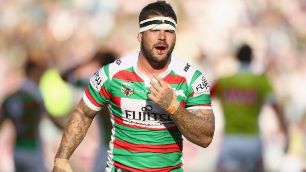 Painful blow: Adam Reynolds looks to the bench after breaking his jaw during the round one NRL match between the Sydney Roosters and the South Sydney Rabbitohs at Allianz Stadium.