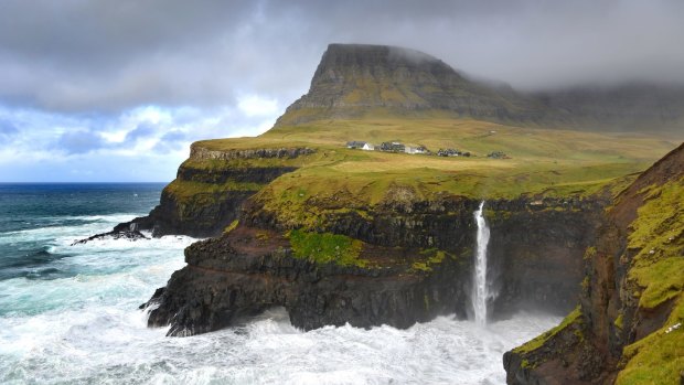 The small village Gasadalur and the Mulafossur waterfall.