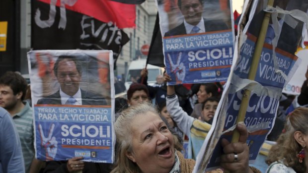 Supporters of presidential candidate Daniel Scioli gather in Buenos Aires on Sunday.