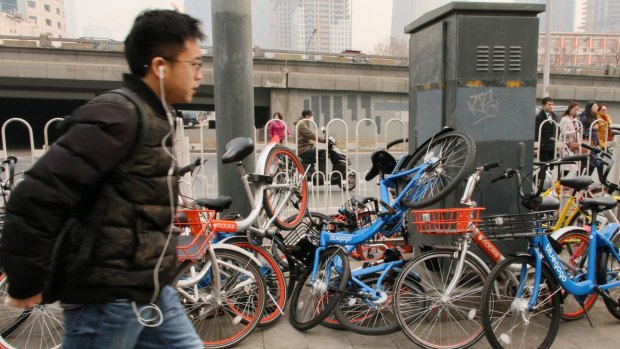 Shared bikes discarded by commuters rushing to work in Beijing's CBD.
 