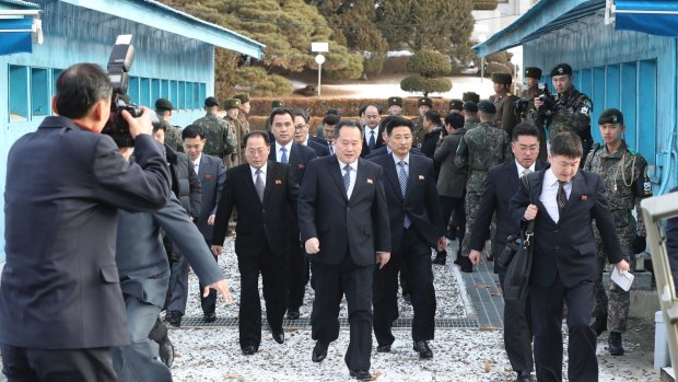 The head of North Korean delegation Ri Son-gwon, centre, arrives at the South side for the meeting in Paju on Tuesday.