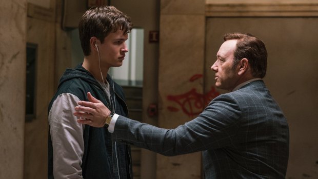 Baby (Ansel Elgort) with his hard-nosed boss, Doc (Kevin Spacey).  