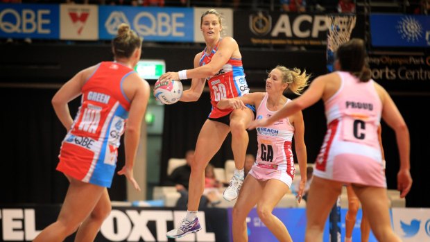 Hitting the heights: Julie Corletto leaps for the ball during the NSW Swifts' win over the Adelaide Thunderbirds.