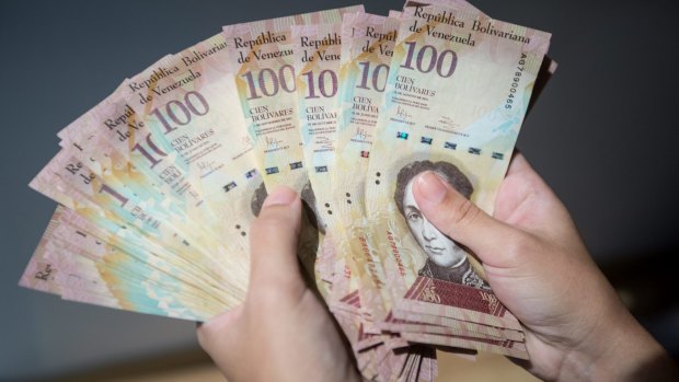 Venezuelan President Nicolas Maduro ordered the central bank to withdraw all 100-bolivar bills from circulation a year ago.