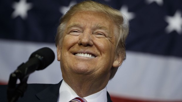 Republican presidential candidate Donald Trump smiles during a campaign rally at the Delaware County Fair on Thursday. He has denied all previous allegations.