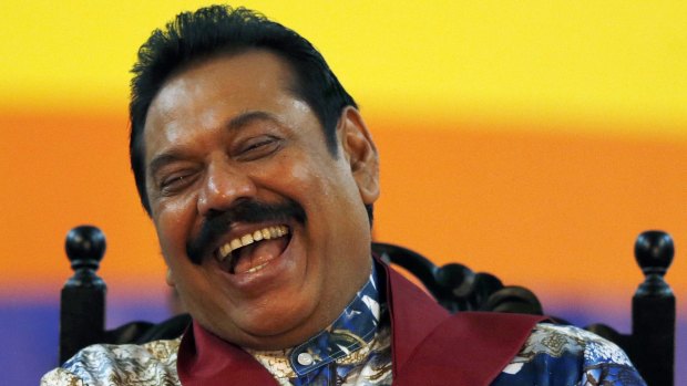Mahinda Rajapaksa smiles at his final election rally in Sri Lanka in January. He subsequently lost the election.