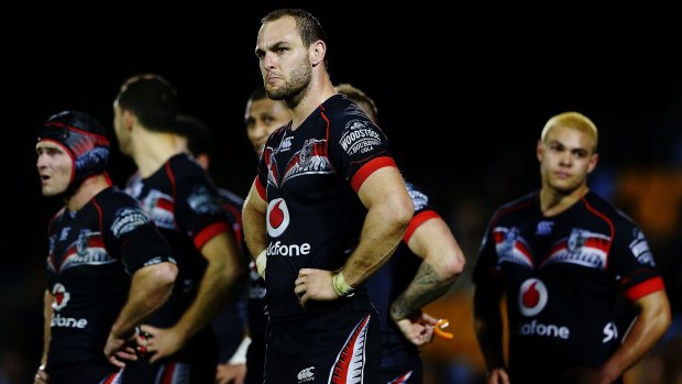 Flogged: Simon Mannering and the Warriors look dejected during the round 24 NRL match against the North Queensland Cowboys at Mt Smart Stadium.
