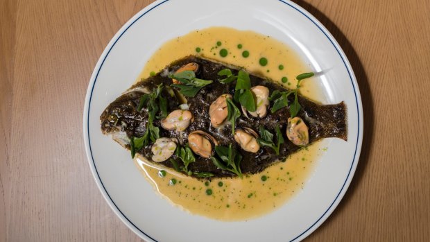 Whole kelp flounder with pickled mussels, warrigal greens and aniseed myrtle.