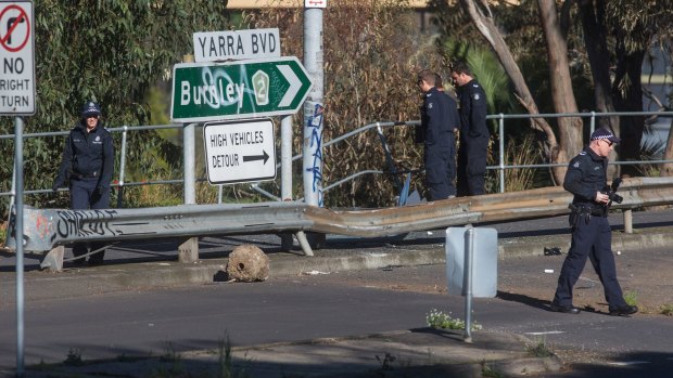 The car plunged into the Yarra River through road barriers on Yarra Boulevard. 