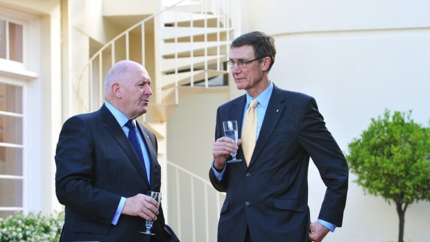 From left, the Governor-General, Sir Peter Cosgrove, and Angus Houston at a welcome reception for the Australian Services Cricket Association's International Defence Cricket Challenge at Government House in Canberra. 