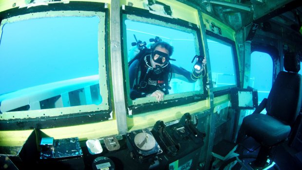 A file photo of a diver at the HMAS Adelaide wreck.
