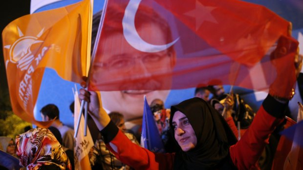 Supporters of Turkey's ruling Justice and Development Party celebrate in Istanbul on Sunday.
