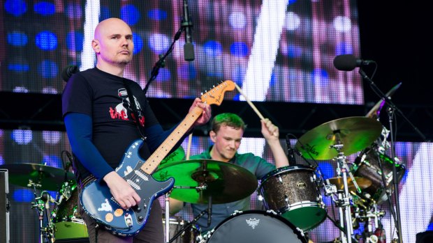 Not happy, AJ: The Smashing Pumpkins, with Billy Corgan at left, were still owed $1.2 million for the February 2015 festival in October.