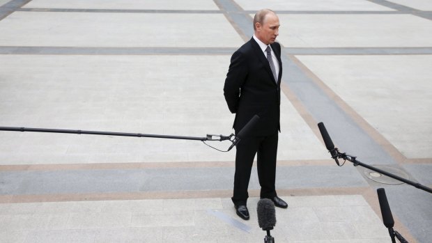 Russian President Vladimir Putin takes questions from journalists after his question-and-answer session with the public on Thursday.