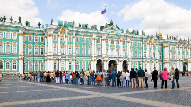 Tourists queue to get into the Hermitage, St Petersburg.