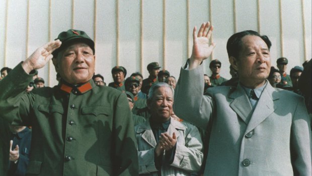 Hu Yaobang, right, then secretary-general of the Chinese Communist Party, reviews a military parade with paramount leader Deng Xiaoping in September 1981. 