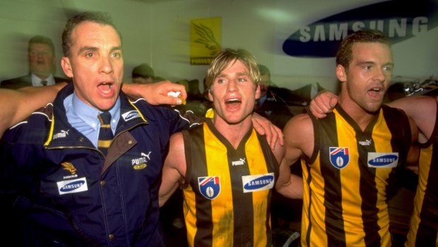 Ken Judge, Shane Crawford and Aaron Lord of Hawthorn in 1999, celebrating after the AFL Round 19 match against Melbourne.