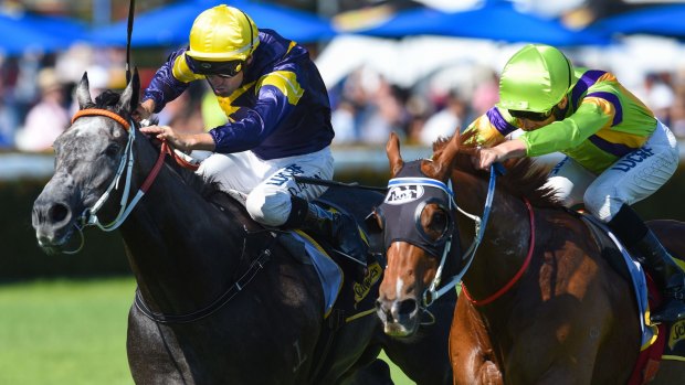Dwayne Dunn on Chautauqua (left) defeats Chad Schofield on Flamberge in the Rubiton Stakes at Caulfield on Saturday.
