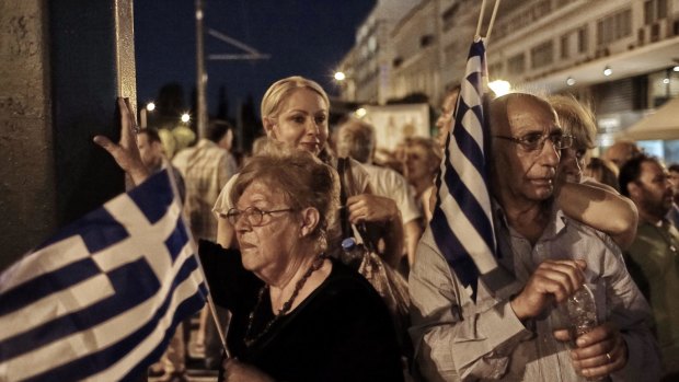 Protesters in Athens on Wednesday hope for an international rethink on Greece's towering debt.