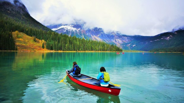 Canoeing on Emerald Lake, Canada.