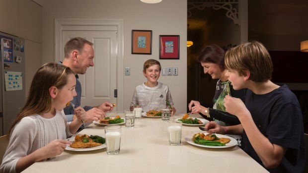 From left, Sophie, Jason, Ben, Suzie and Cam eat plenty of vegetables with dinner.