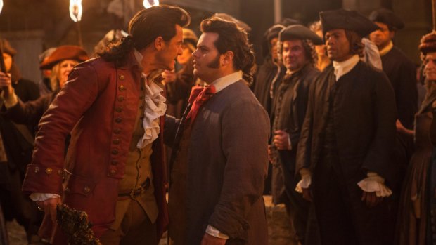 Show stealers: Luke Evans as Gaston and Josh Gad (left) as Lefou.