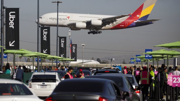 Passengers wanting to use ride-share services at LAX will now need to take a bus to a special pick-up area.