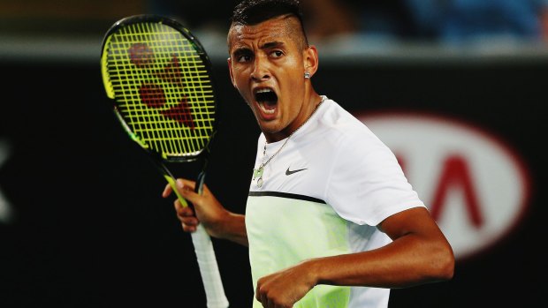 Nick Kyrgios celebrates a point during day one of the Australian Open.