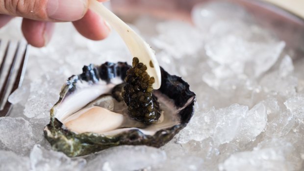 Otto is selling a natural oyster with a caviar supplement which costs extra.