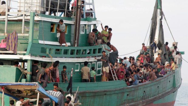 Rohingya and Bangladeshi refugees await rescue by Acehnese fishermen off East Aceh, Indonesia, in May 2015.