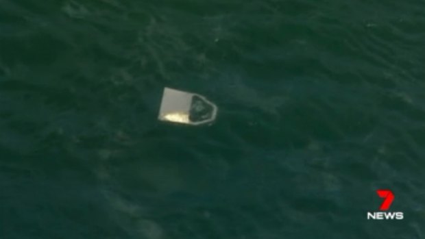 Debris seen floating in the river where the sea plane went down. 