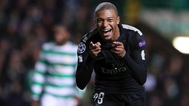 PSG's Kylian Mbappe celebrates after scoring in the French club's rout of Celtic.