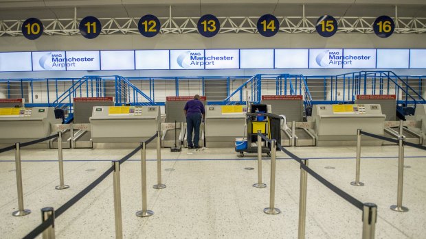 Thomas Cook's empty check-in desks at Manchester Airport.